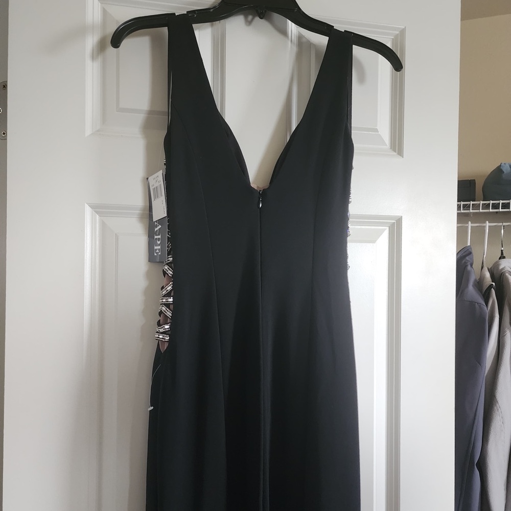 Xscape Black Backless V-Neck Evening Gown with Side Lace Accent